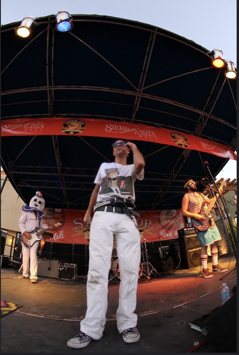 Fisheye view of a band performing on an outdoor stage