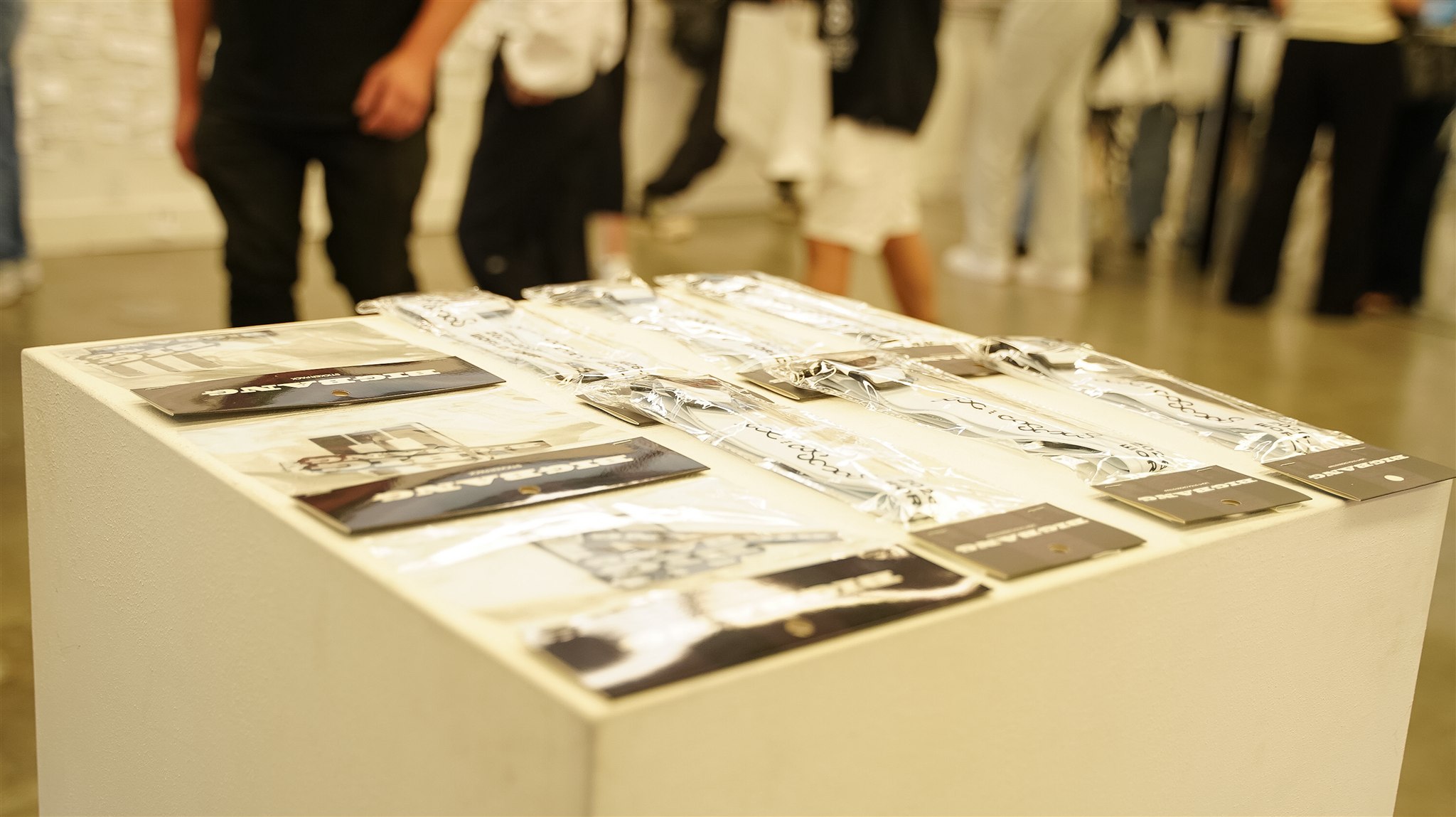 Packaged BIGBANG merchandise arranged on a display table